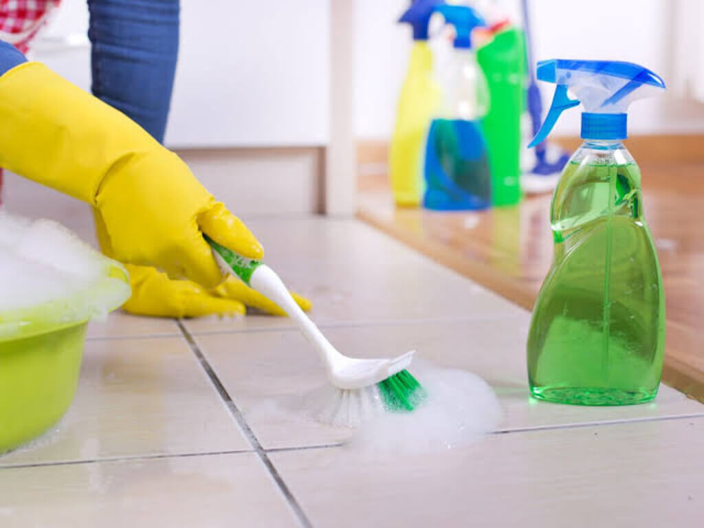 An image of someone cleaning floor tiles | Wutarick Store
